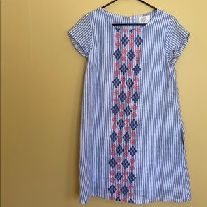 Seersucker tent dress with embroidery details.